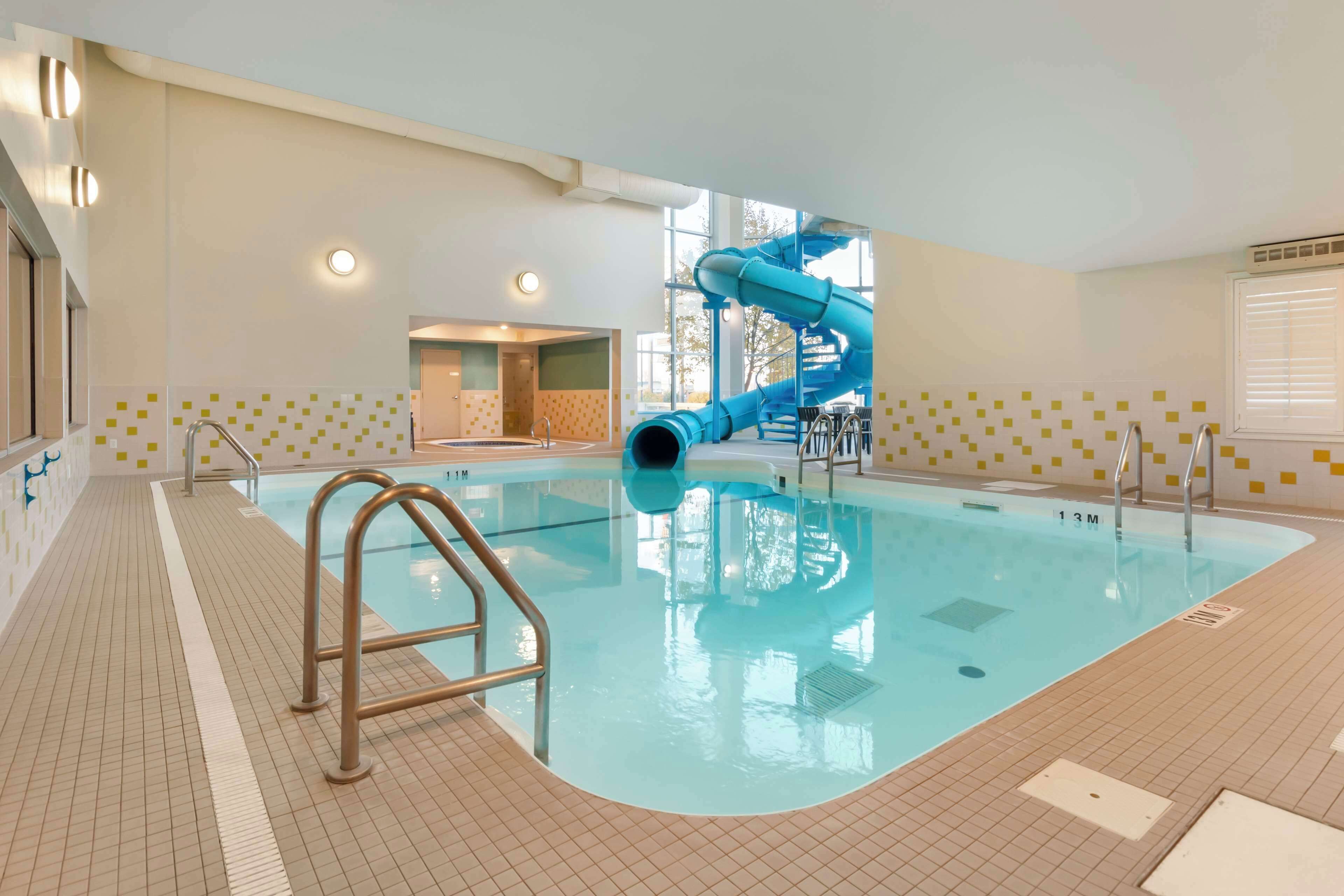 indoor pool, open 9:00 am to 10:00 pm, pool loungers