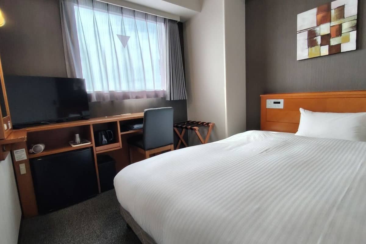 Desk, blackout drapes, iron/ironing board (on request), WiFi (free)