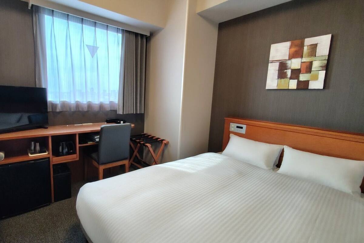 Desk, blackout drapes, iron/ironing board (on request), WiFi (free)