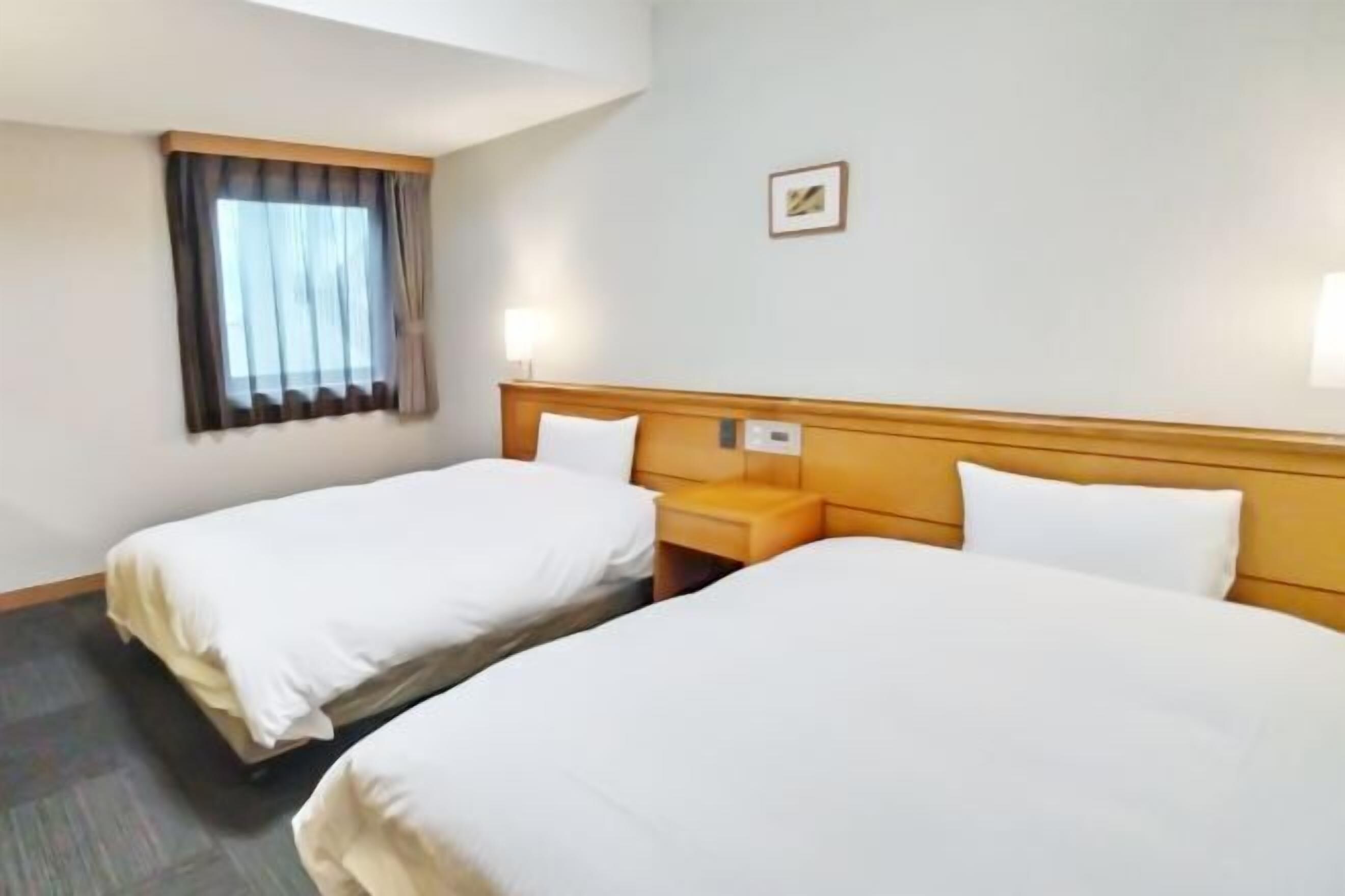 Desk, blackout curtains, free WiFi, bed sheets