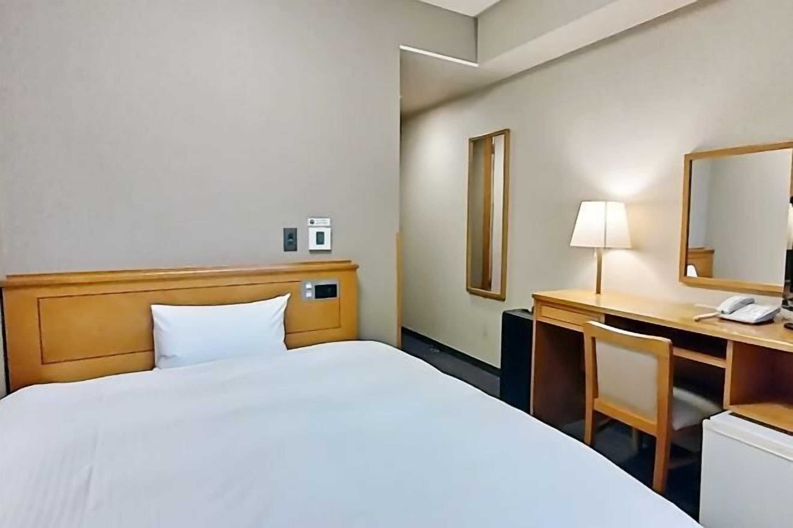 Desk, blackout curtains, free WiFi, bed sheets