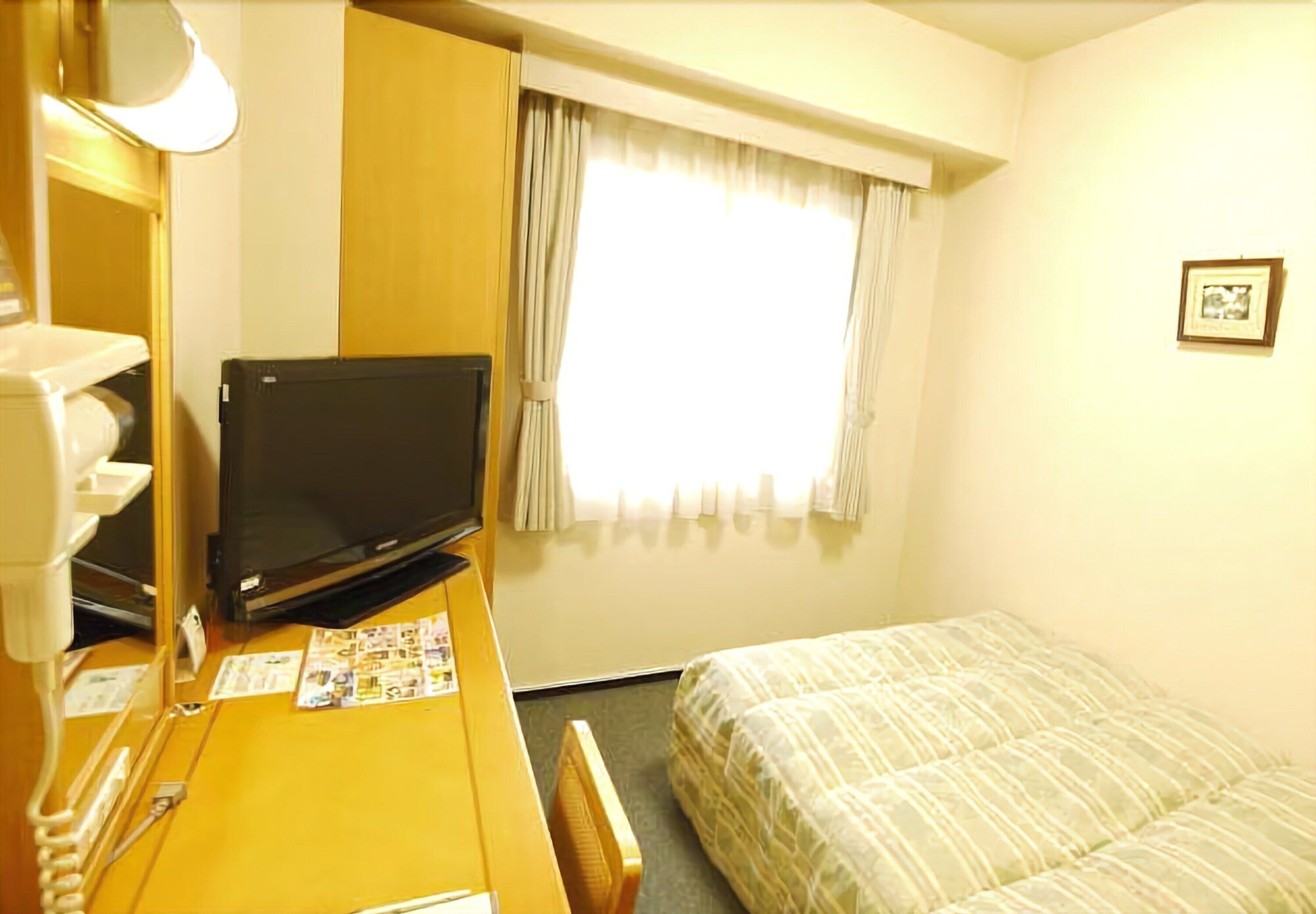 1 bedroom, desk, blackout curtains, iron/ironing board