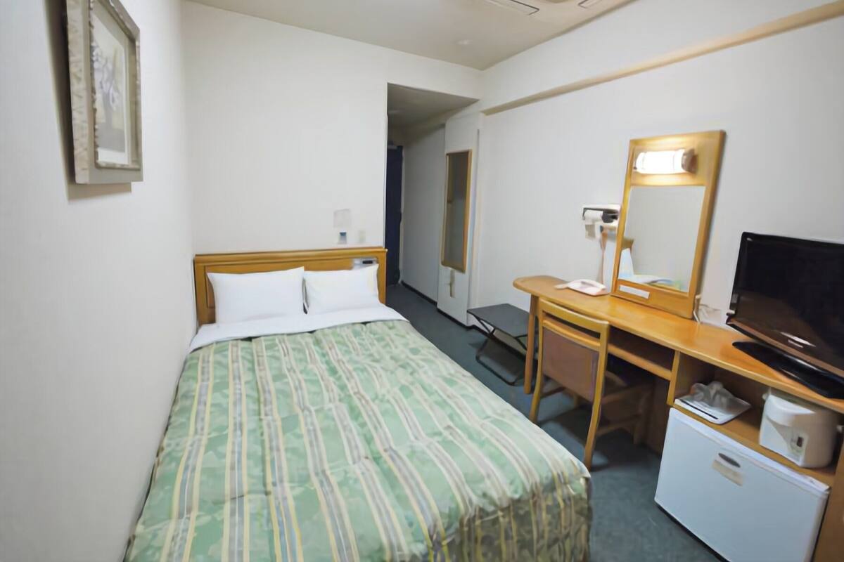 Desk, blackout curtains, iron/ironing board (on request), free WiFi