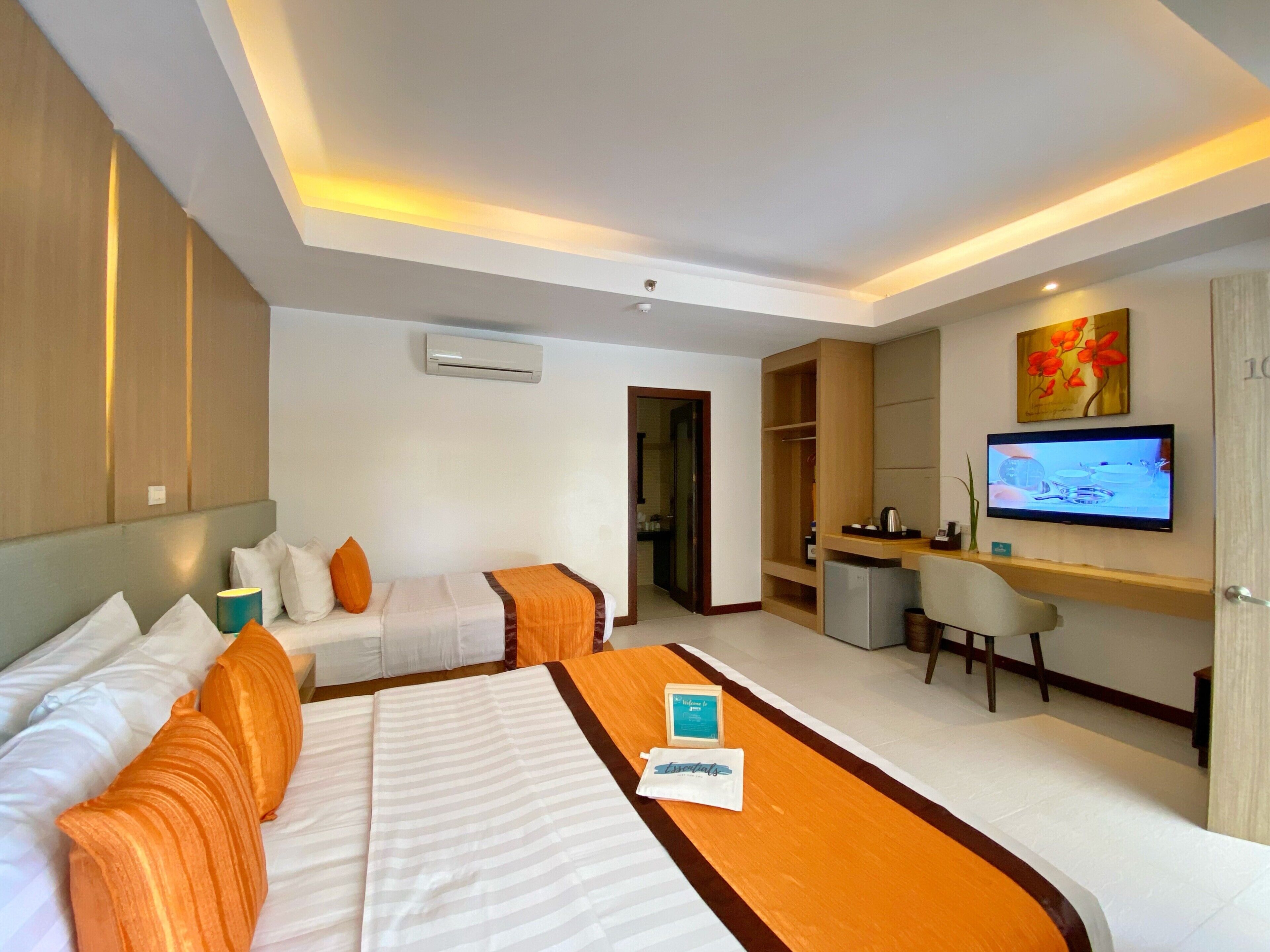 superior twin room | minibar, in-room safe, desk, laptop workspace