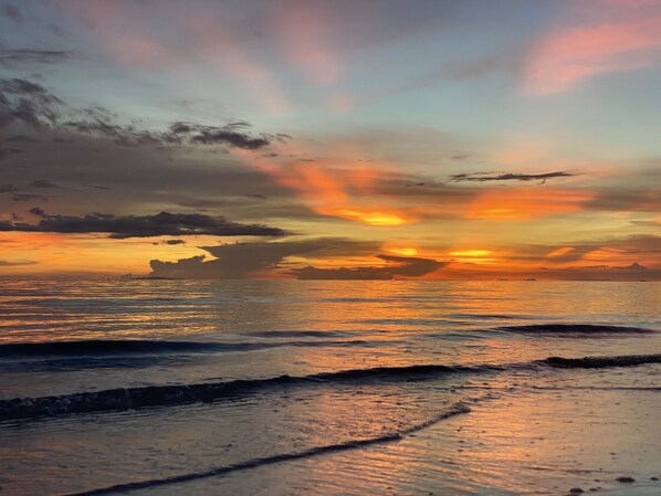 On the beach, white sand, beach towels