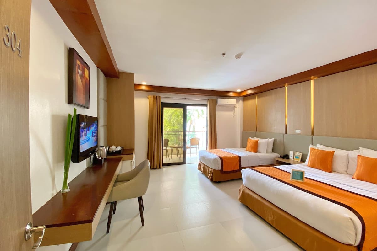 superior triple room | minibar, in-room safe, desk, laptop workspace