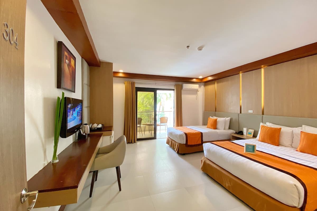 Superior Triple Room | Minibar, in-room safe, desk, laptop workspace