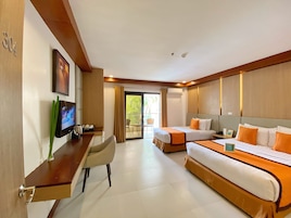 Superior Triple Room | Minibar, in-room safe, desk, laptop workspace