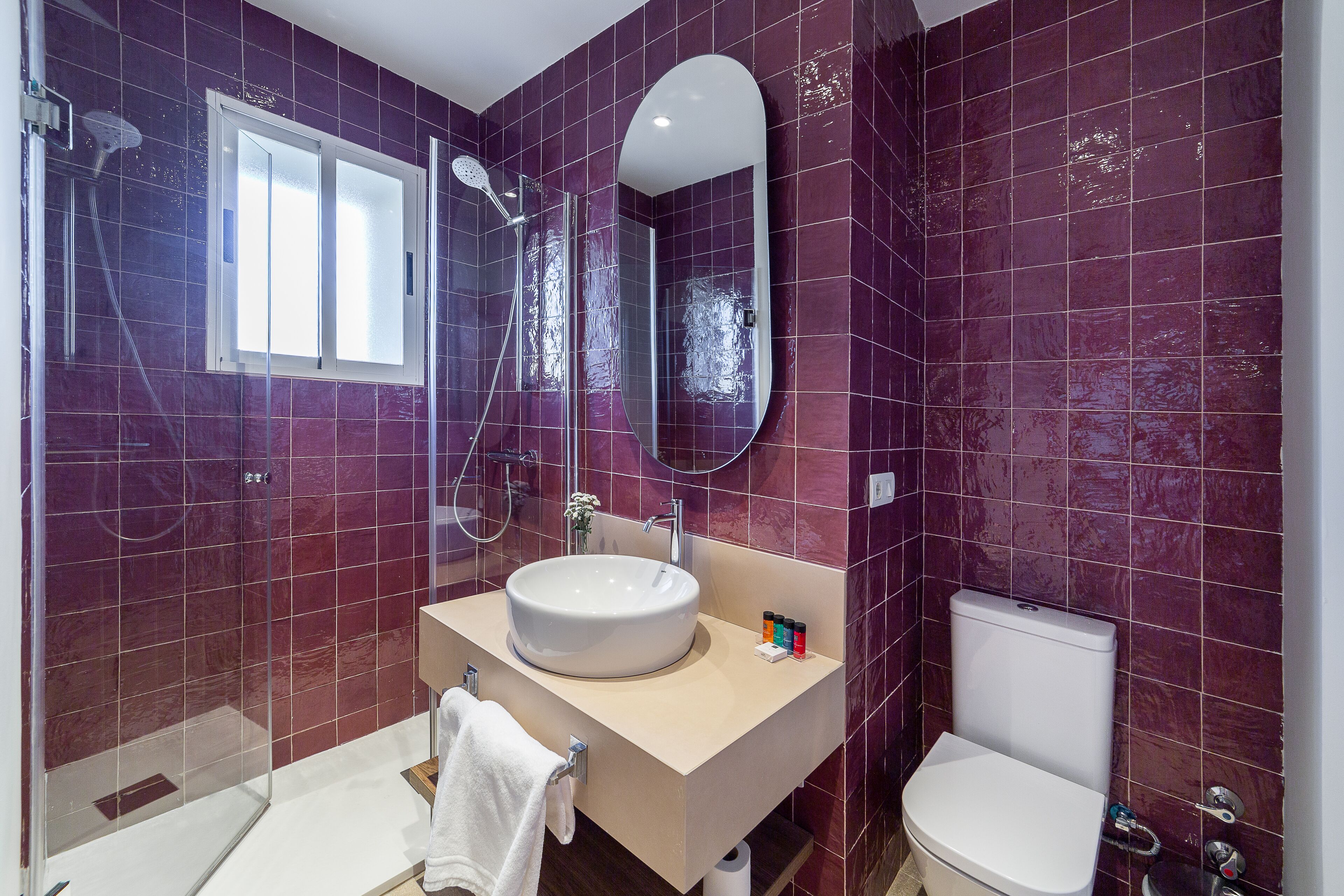 shower, free toiletries, hair dryer, towels