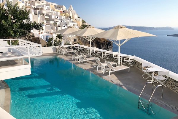 Seasonal outdoor pool, pool umbrellas, pool loungers