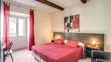 Sábanas italianas Frette y caja de seguridad en la habitación