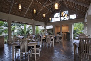 Breakfast, lunch, dinner served; international cuisine, pool views