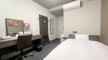 Blackout curtains, iron/ironing board, free wired Internet, bed sheets