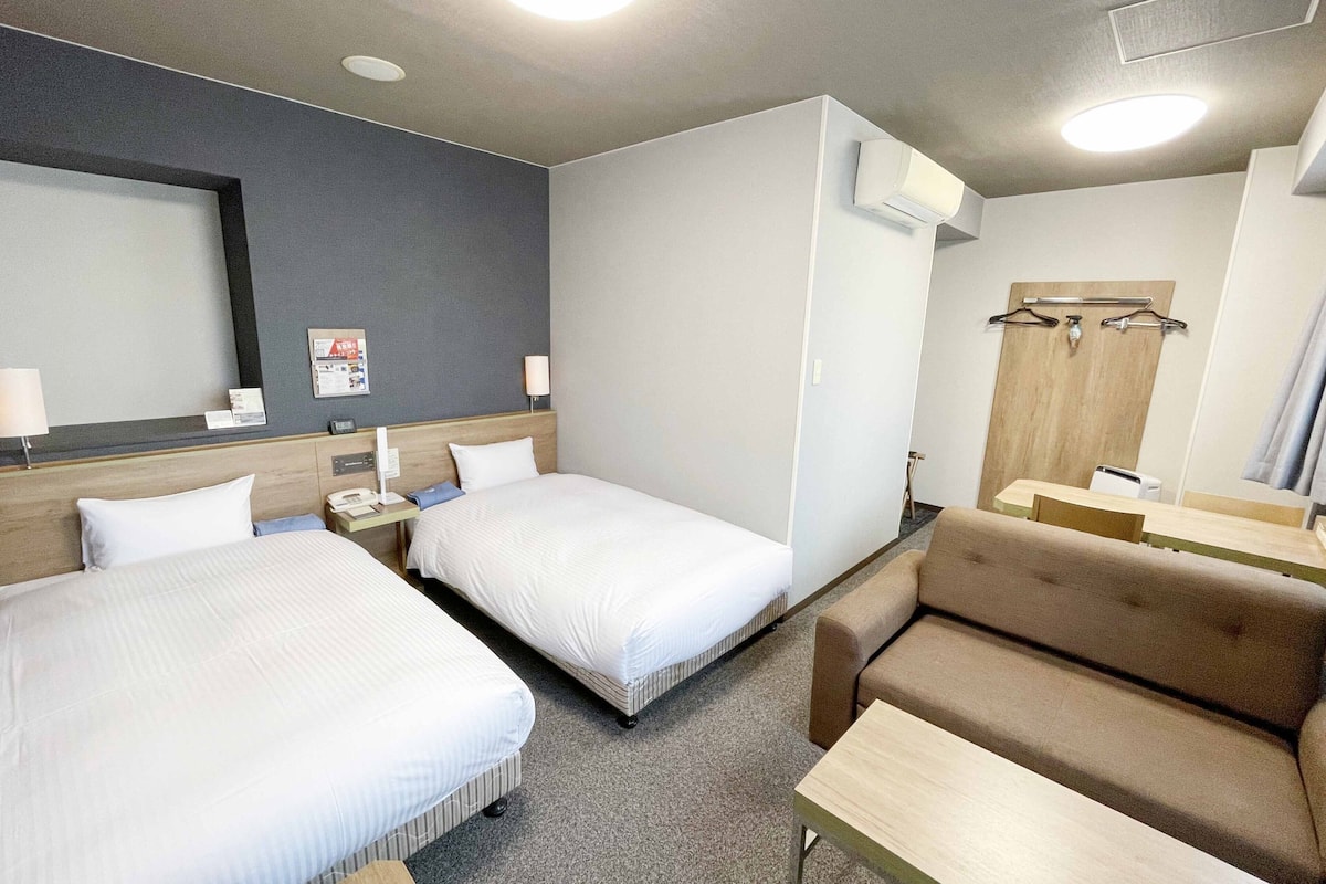 blackout curtains, iron/ironing board, free wired internet, bed sheets