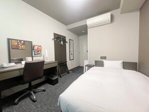 Blackout drapes, iron/ironing board, free wired internet, bed sheets