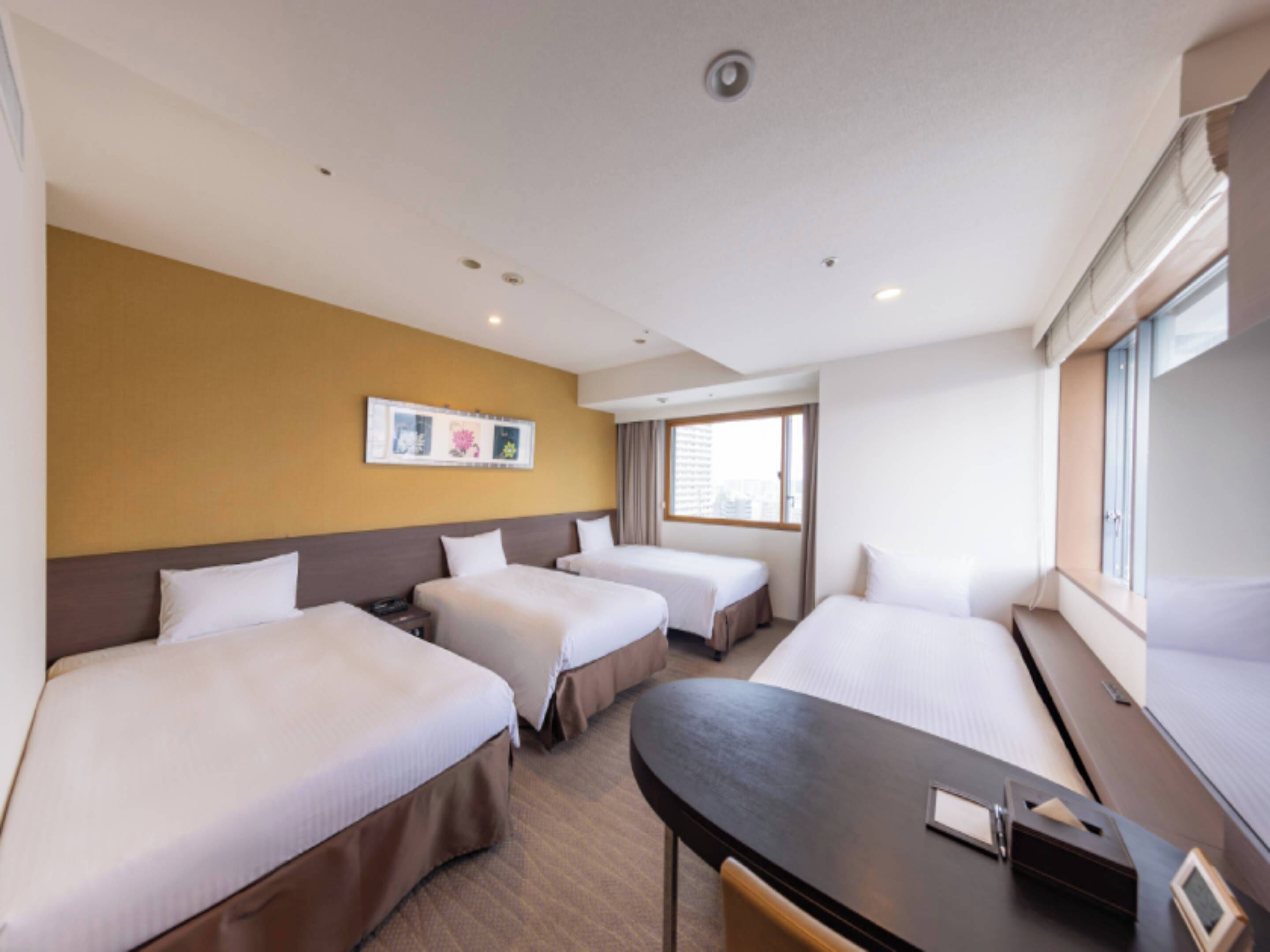 Family Quadruple Room, Non Smoking, City View | Premium bedding, in-room safe, blackout drapes