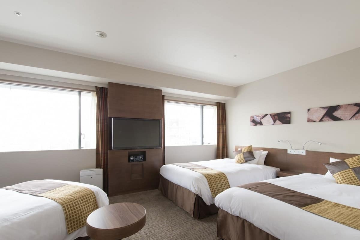 Superior Triple Room, Non Smoking | Premium bedding, in-room safe, desk, blackout drapes