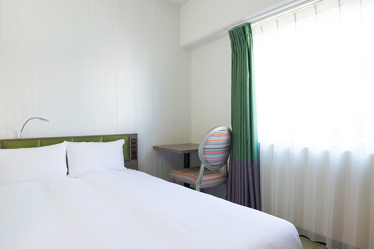 Down duvets, desk, blackout curtains, iron/ironing board