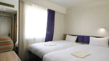 Down duvets, desk, blackout curtains, iron/ironing board