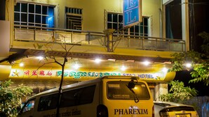 A multi-story building with a prominent vertical sign reading "STAR HOTEL". - Star Hotel (Battambang)