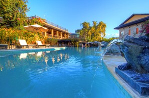 Outdoor pool, pool umbrellas, pool loungers