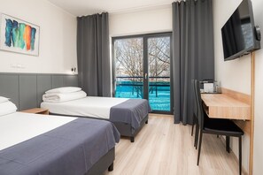 Standard Twin Room | Iron/ironing board, free WiFi, bed sheets - Hotell Tammsaare Full Automated Hotel (Parnu)