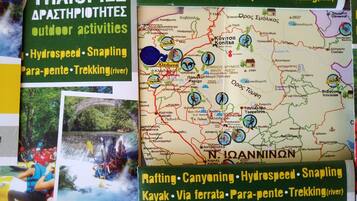 A travel map highlighting outdoor activities like rafting, canyoning, and trekking.