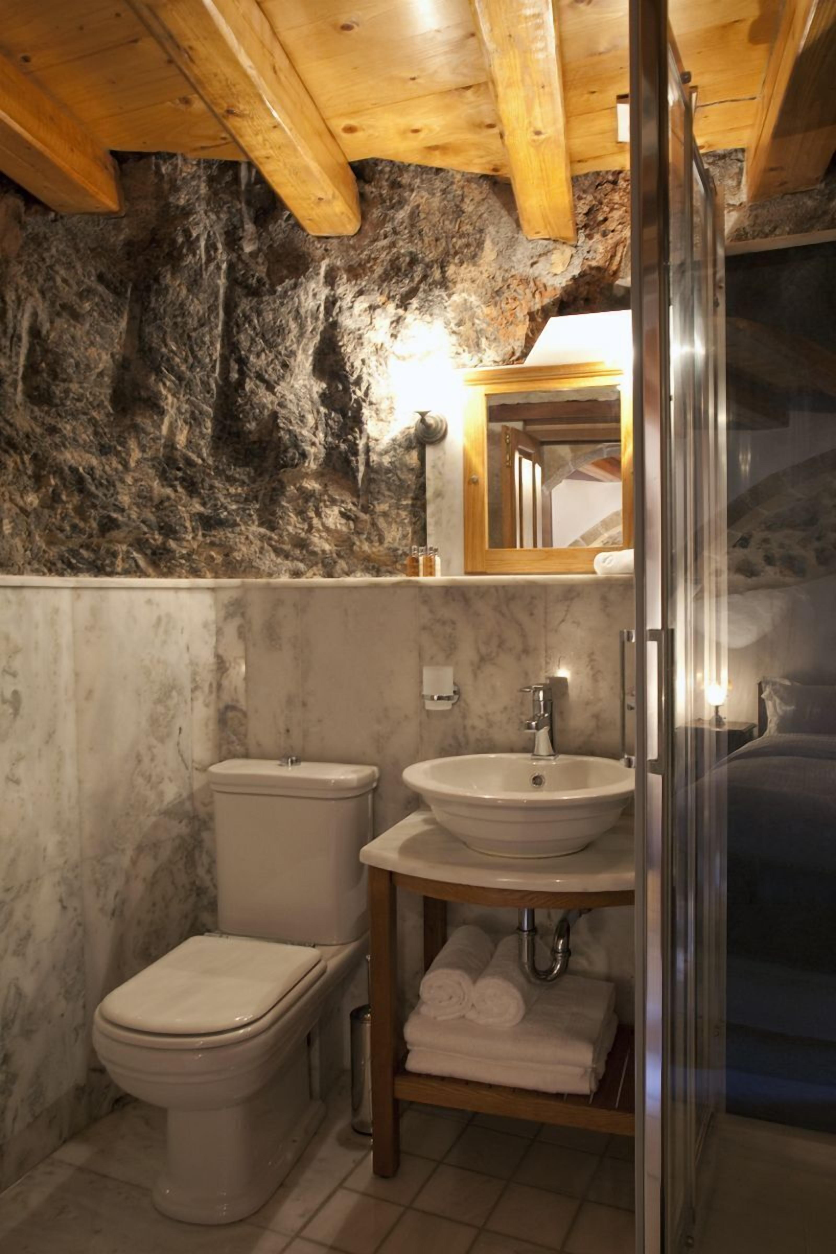 shower, designer toiletries, hair dryer, slippers