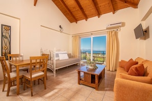 Appartement Deluxe, 1 chambre, balcon | Coin séjour