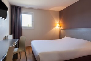 Familiekamer | Een bureau, geluiddichte muren, gratis babybedden, gratis wifi