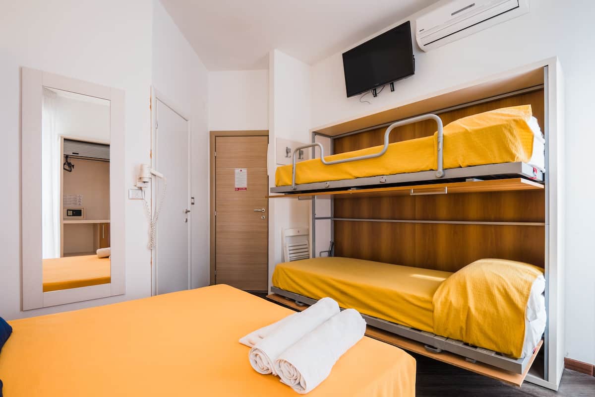 Quadruple Room | Egyptian cotton sheets, down comforters, pillowtop beds, minibar