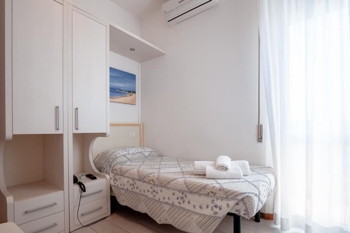Basic Single Room | Egyptian cotton sheets, down comforters, pillowtop beds, minibar