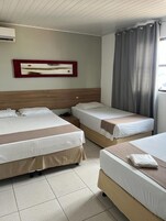 STANDARD QUADRUPLE (1CSL + 2 SOLT) | Minibar, in-room safe, desk, free WiFi