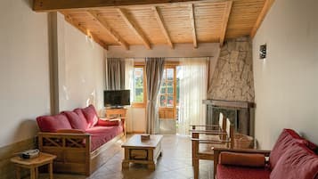 Suite, 1 habitación, vista al lago | Área de sala de estar