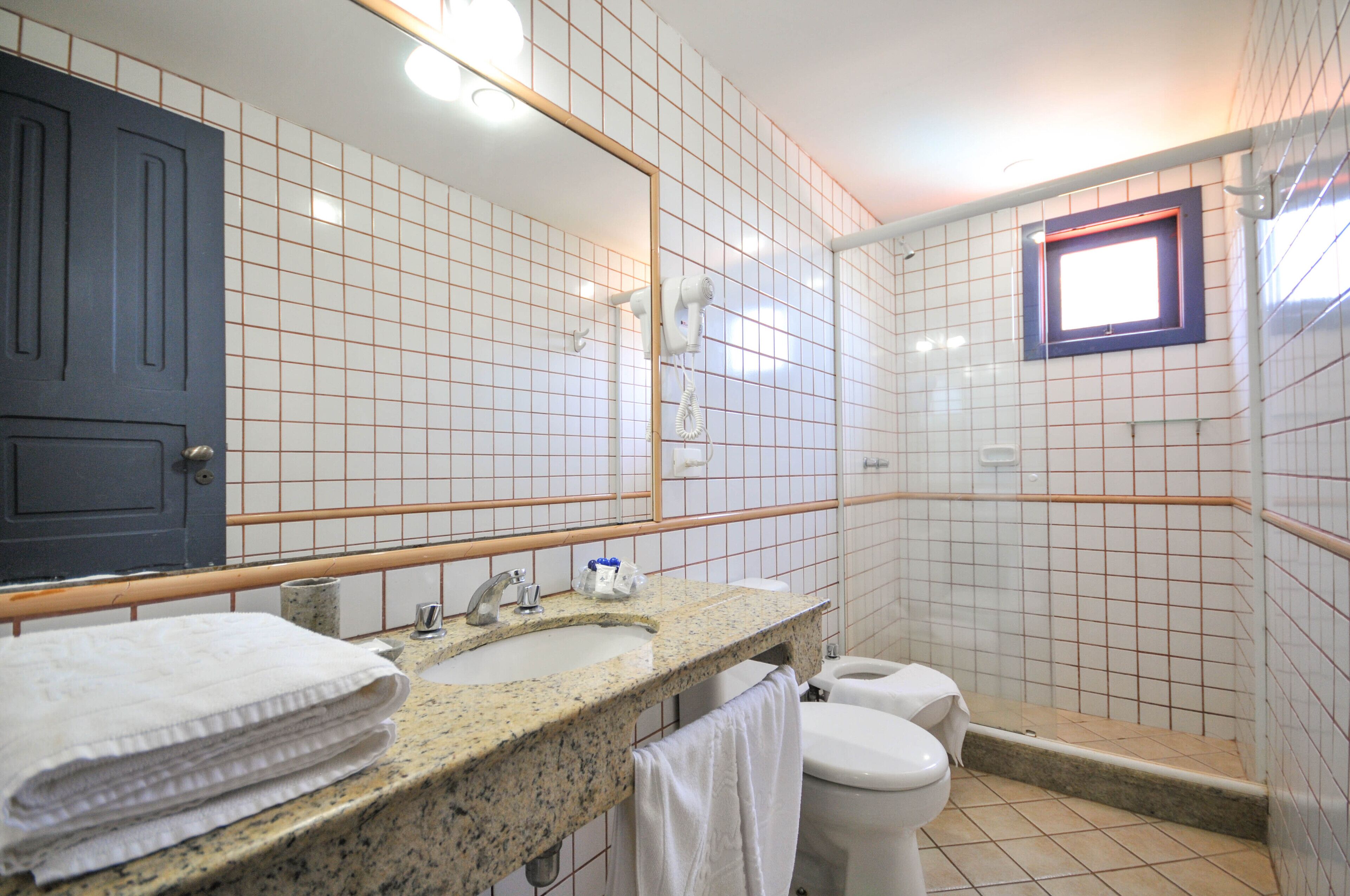 family room | bathroom | shower, free toiletries, hair dryer, bidet