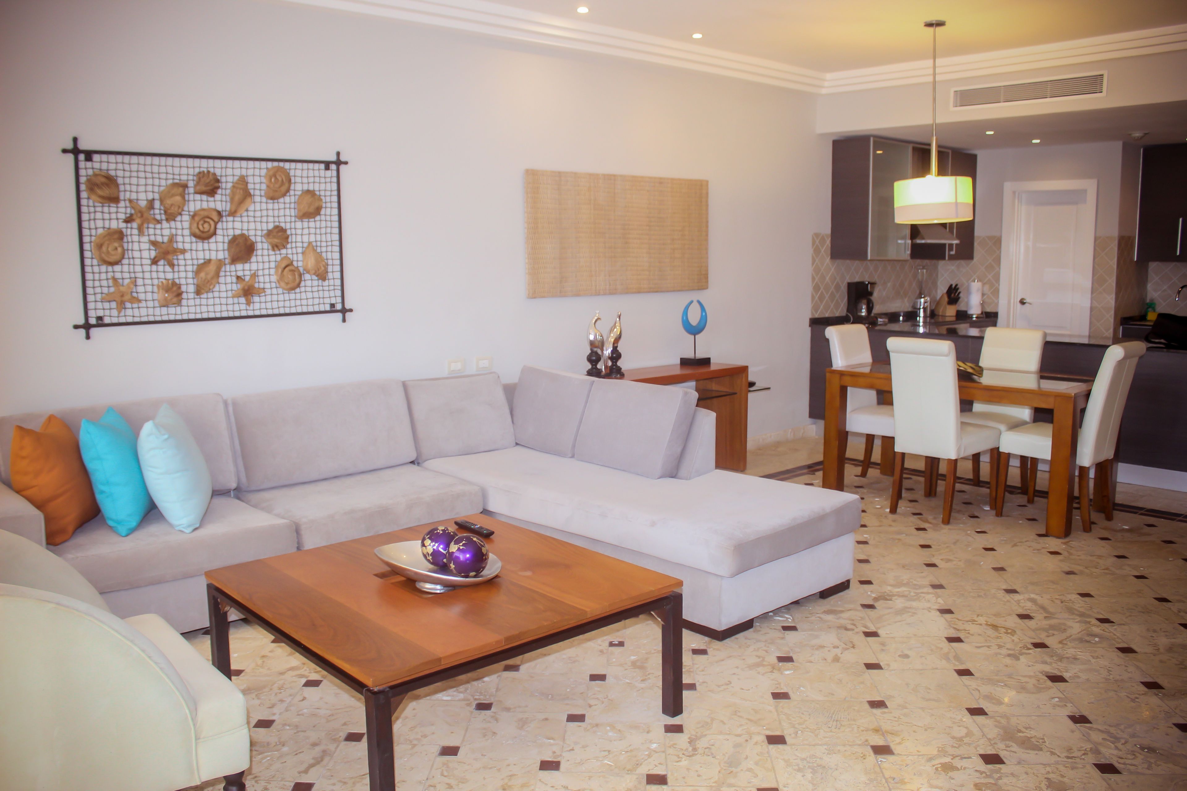 The Deluxe One-Bedroom Residence, All-Inclusive | Living area | 32-inch LCD TV with satellite channels, TV, DVD player