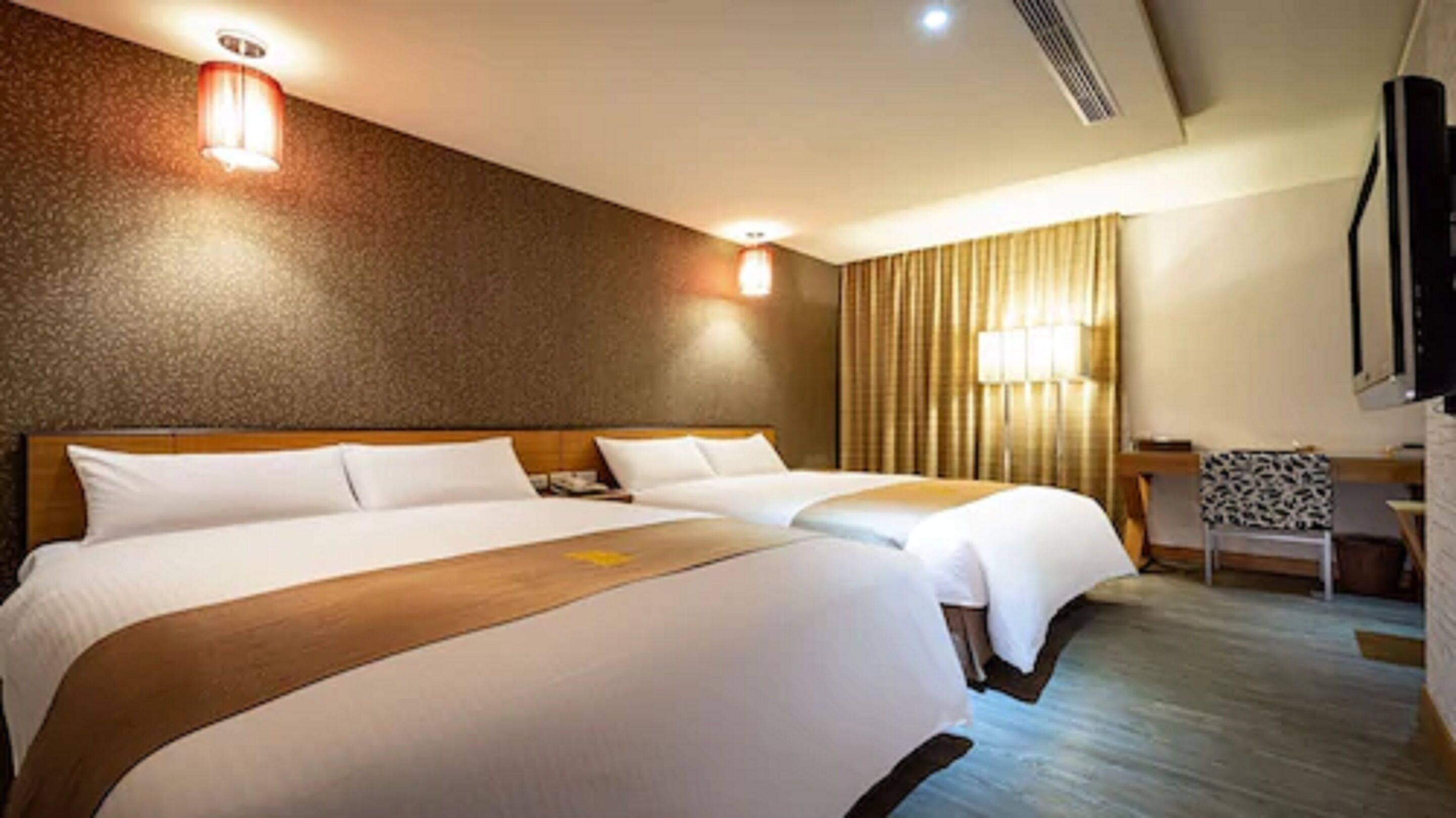 family room, 2 double beds | down duvets, individually decorated, desk, blackout curtains