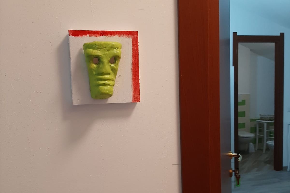 A room with a door leading to another area.