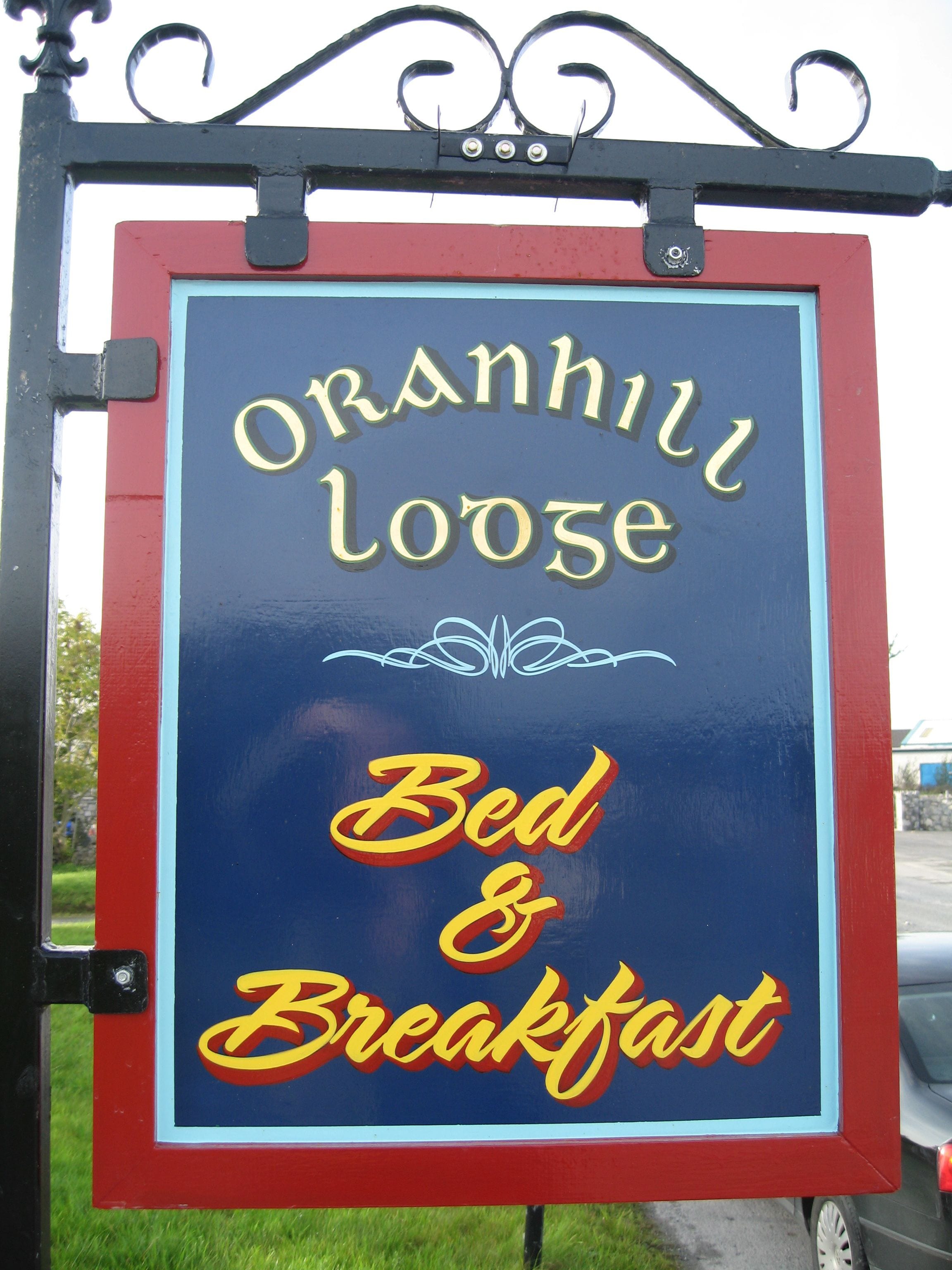 A sign for Oranhill Lodge advertising Bed & Breakfast services.