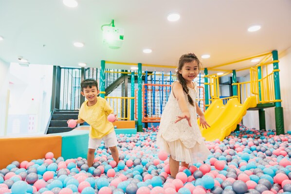 Children playing in a ball pit with a slide. - WorldHotels Long Beach Resort Phu Quoc (Phu Quoc)