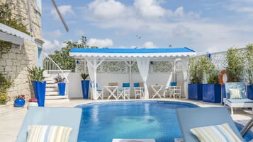 Outdoor pool, pool umbrellas, pool loungers