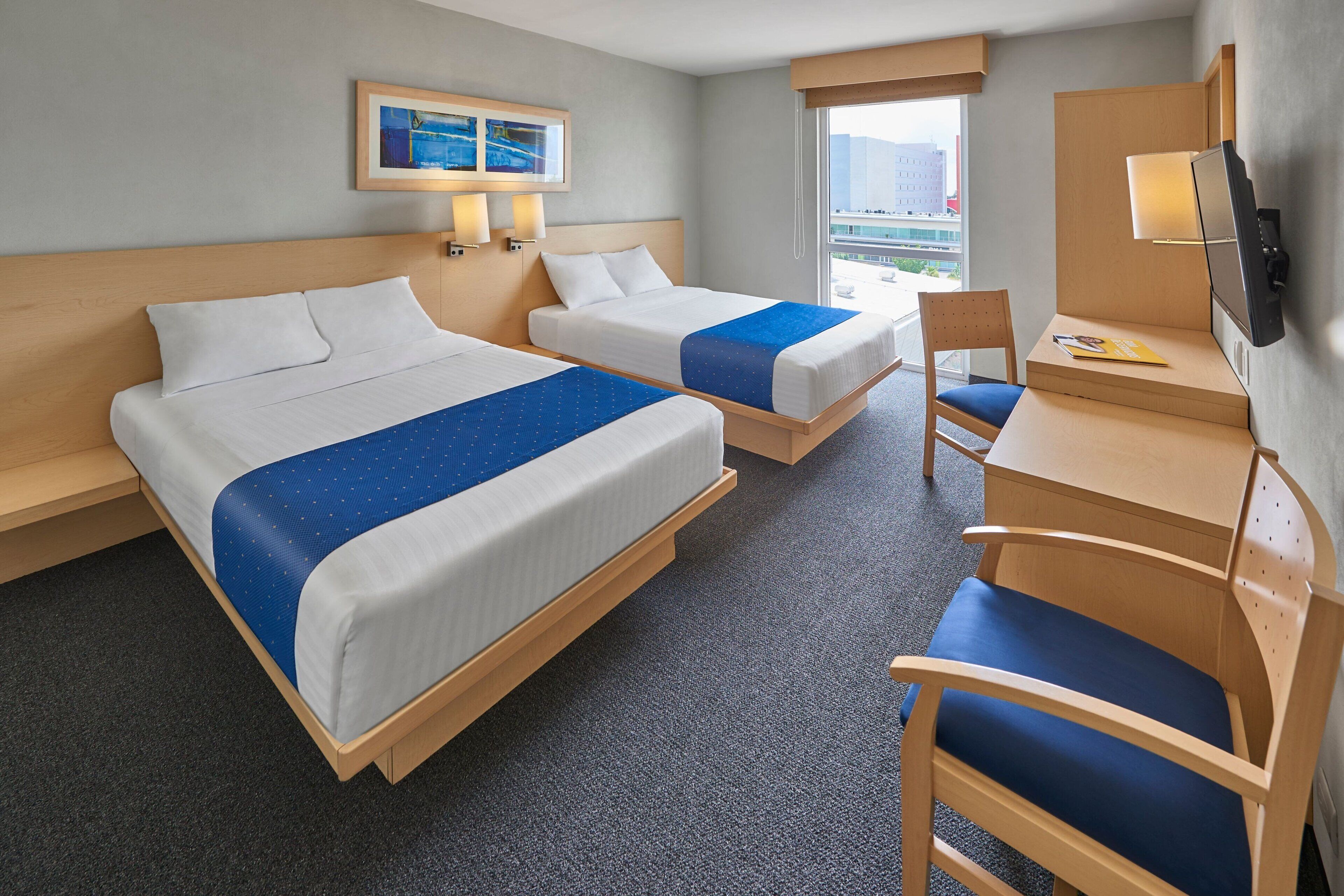 room, 2 double beds | 1 bedroom, desk, iron/ironing board, free cots/infant beds