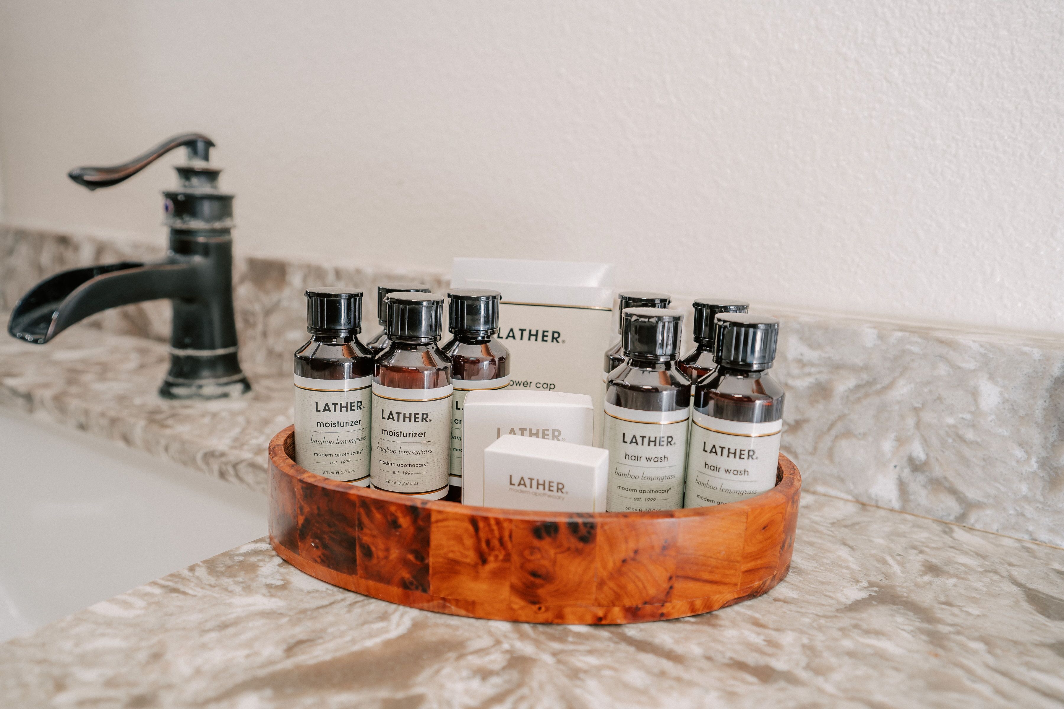 deluxe room, multiple beds, partial ocean view | bathroom | shower, free toiletries, hair dryer, bathrobes