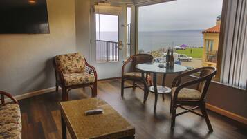 Deluxe Room, 1 King Bed with Sofa bed, Ocean View | Living area | LCD TV