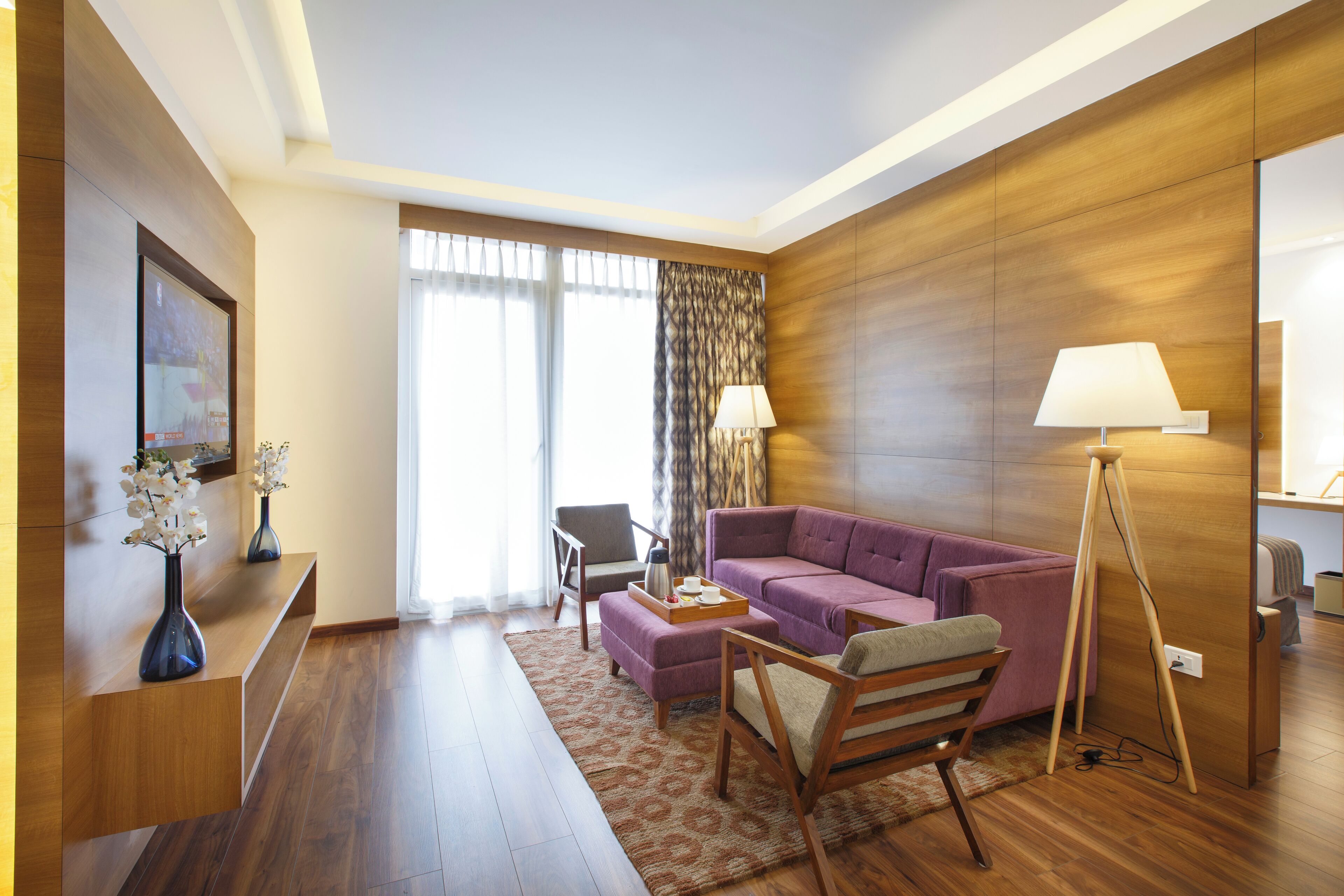 junior suite with balcony | living area | 31-inch flat-screen tv with satellite channels, tv