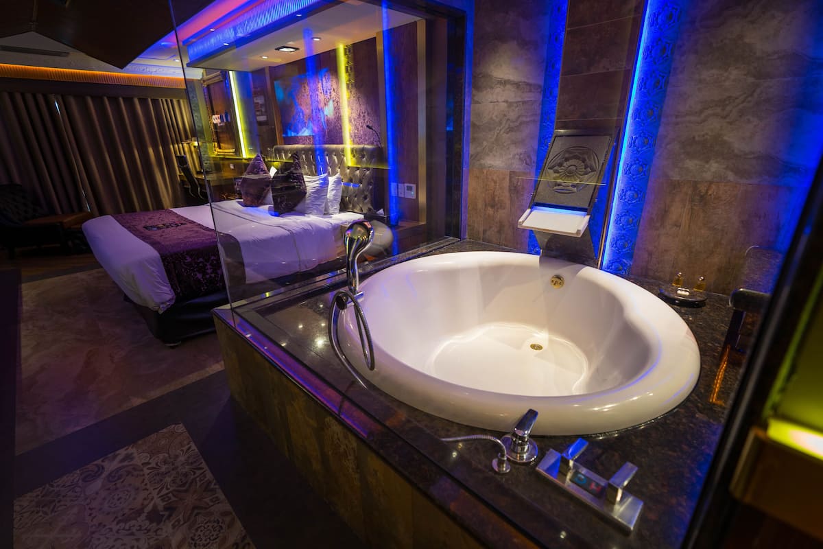 aqua suite | bathroom | separate bathtub and shower, free toiletries, hair dryer, bathrobes
