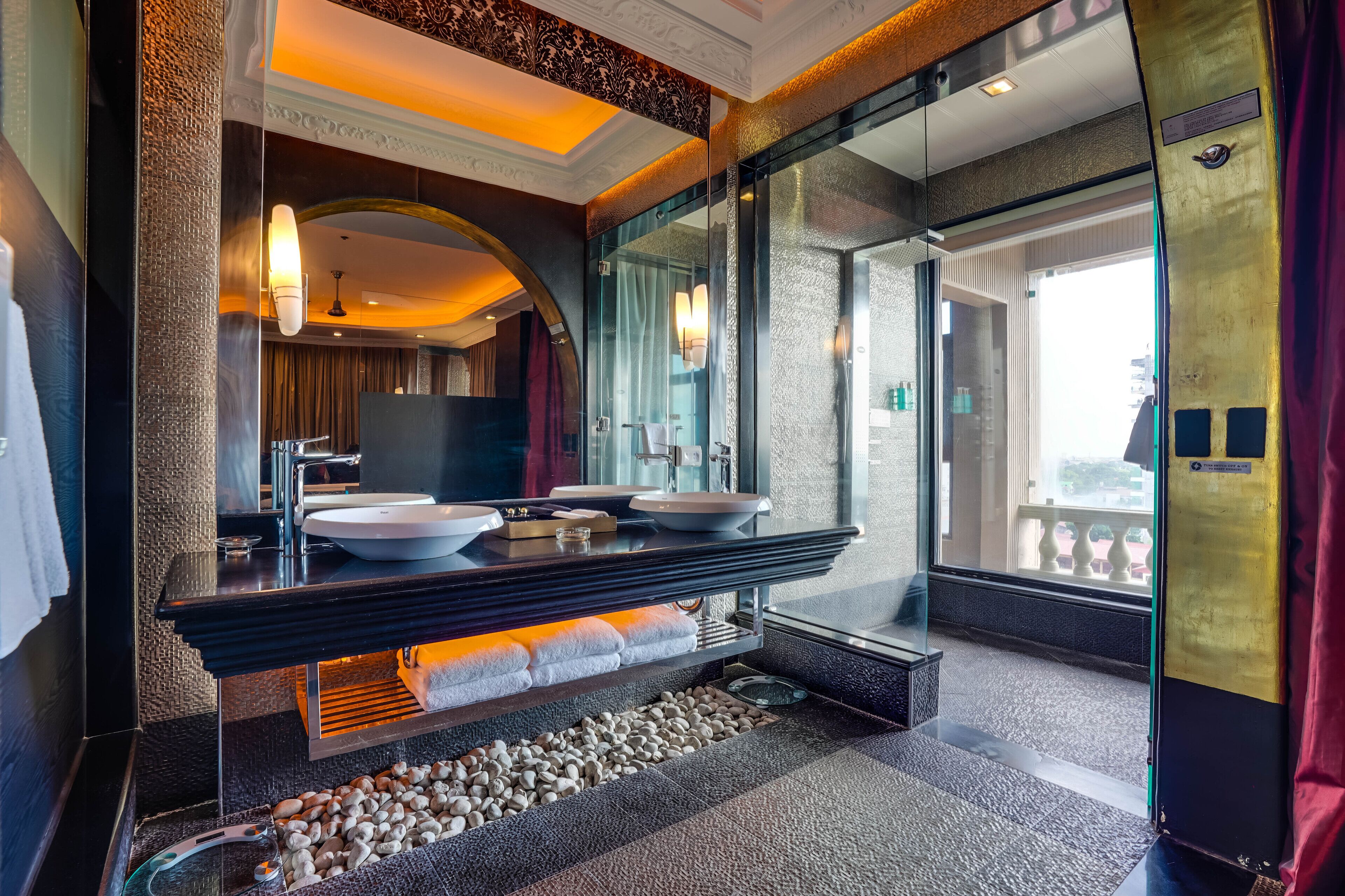 new millennium penthouse 2-bedroom suite, 2 big round beds | bathroom sink