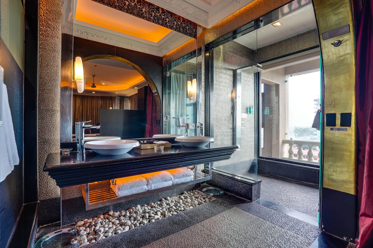 new millennium penthouse 2-bedroom suite, 2 big round beds | bathroom sink