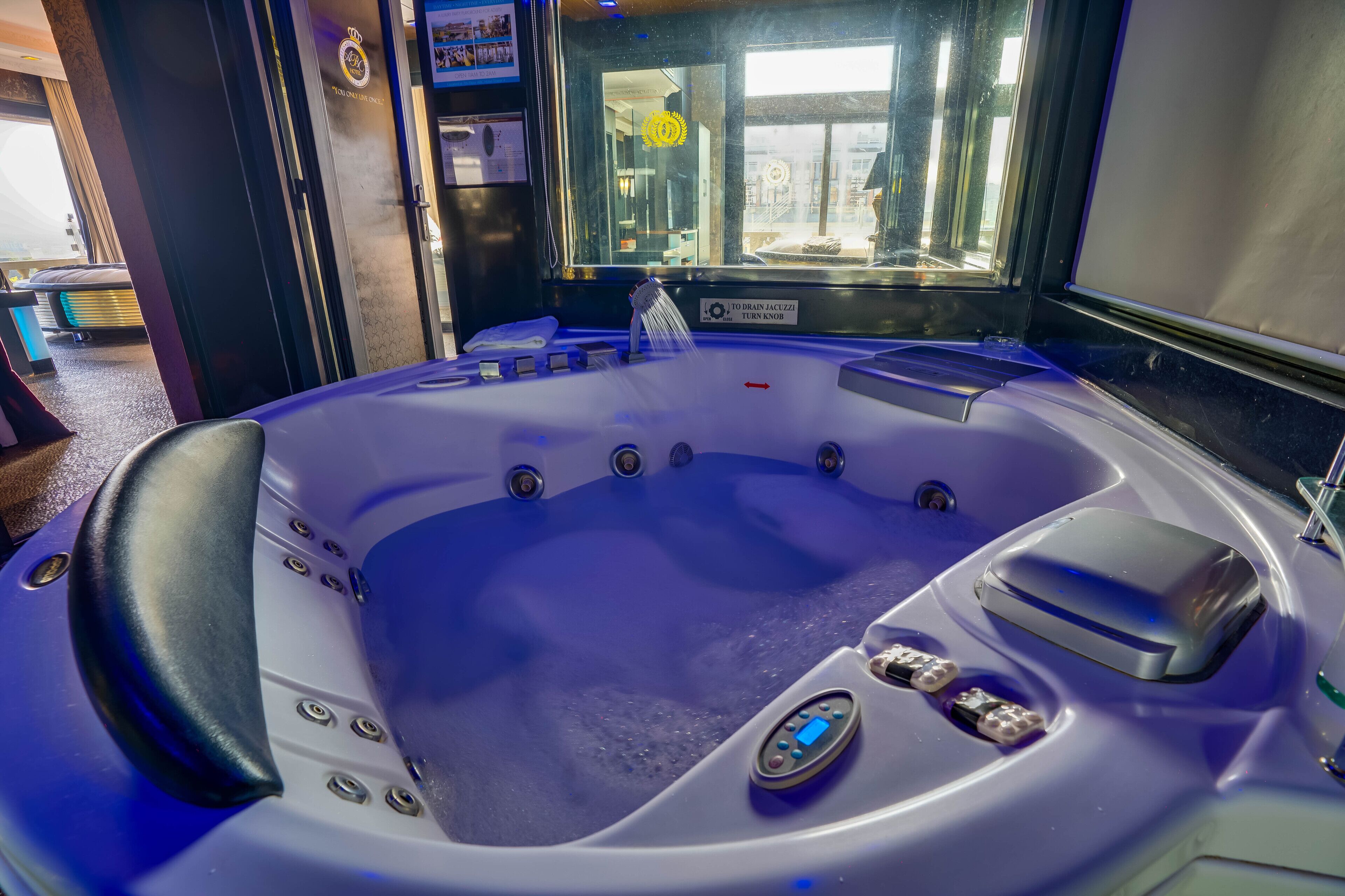 new millennium penthouse 2-bedroom suite, 2 big round beds | jetted bathtub