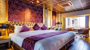 Loftsleilighet | Sengetøy av topp kvalitet, minibar og safe på rommet